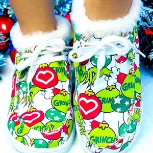Comfy cozy grinch slippers! Dont miss out on these!